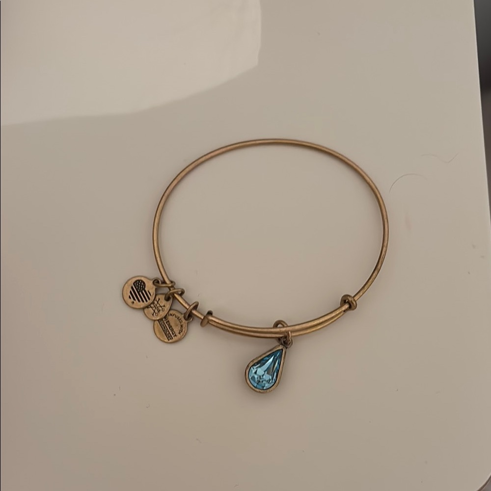 Alex and Ani Gold Bracelet with birth stone ( march )